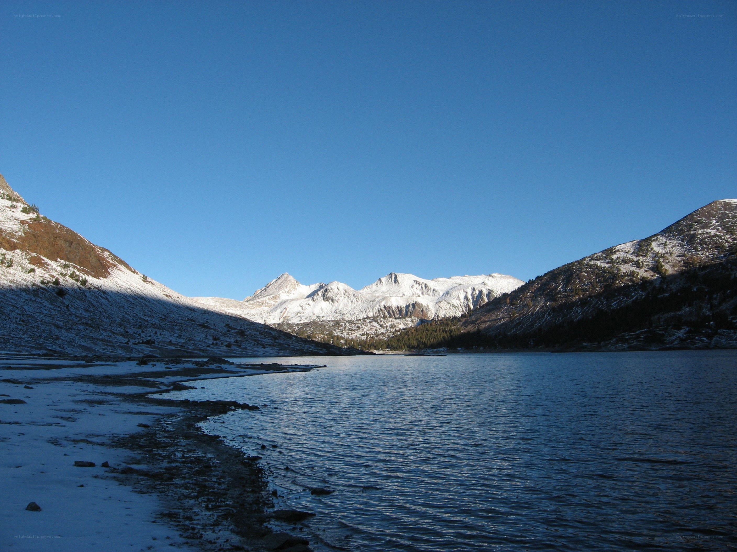 Snowy mountains and lake