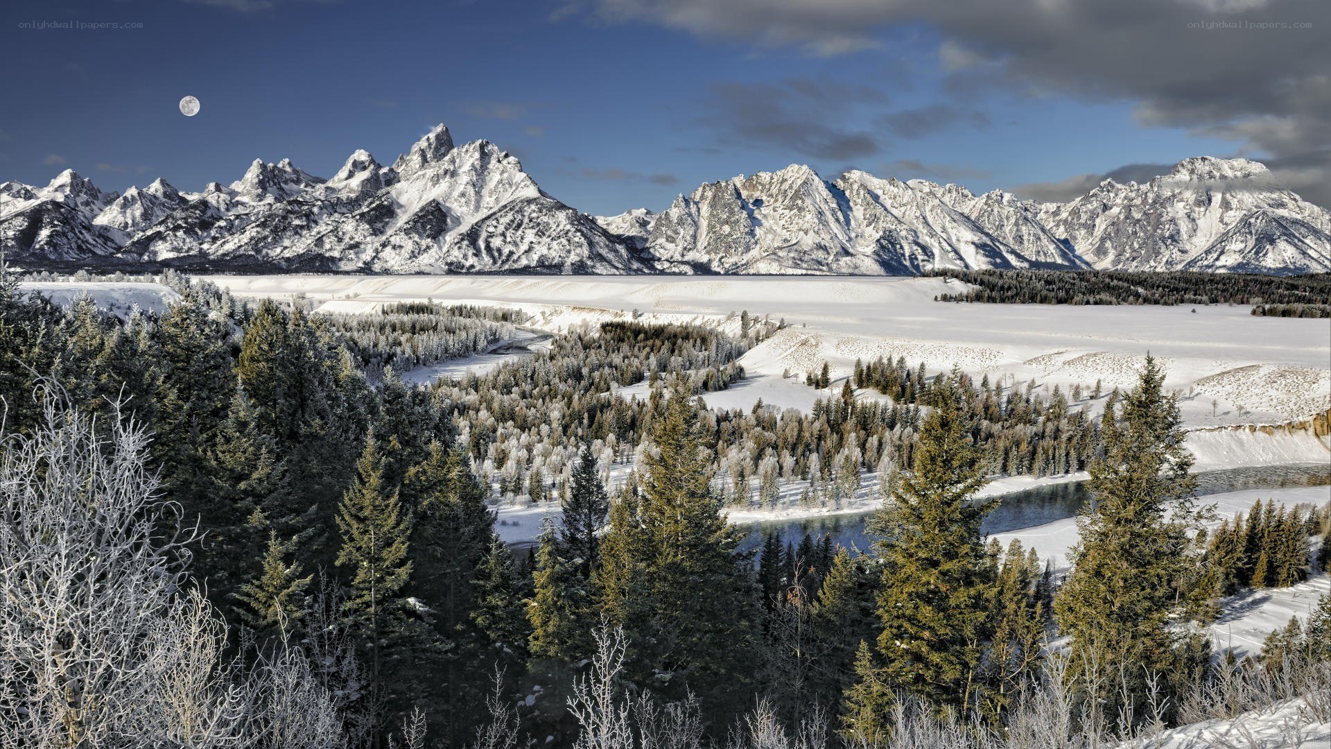 Snowy mountains and moonlit valley