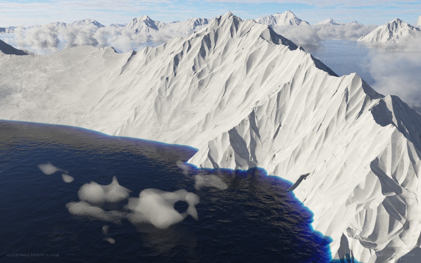 snowy mountains and ocean