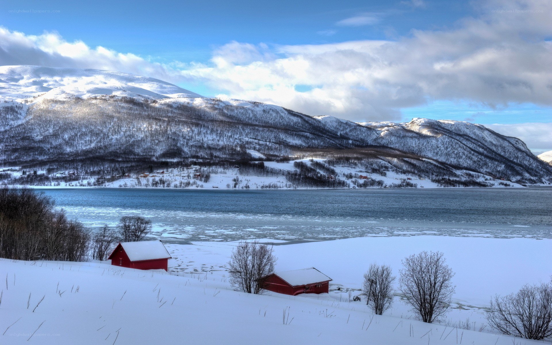 Snowy mountains and red cabins