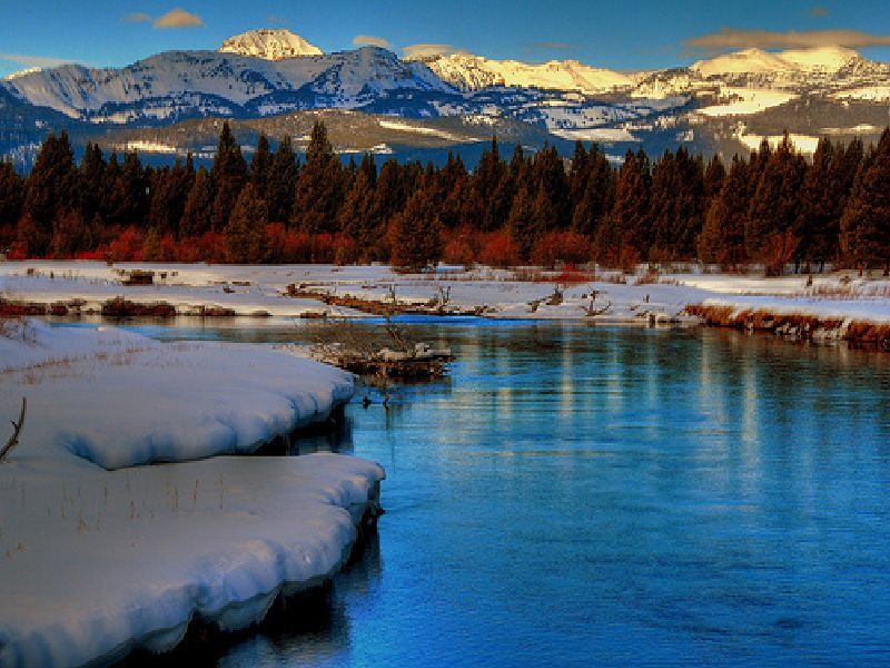 Snowy mountains and river