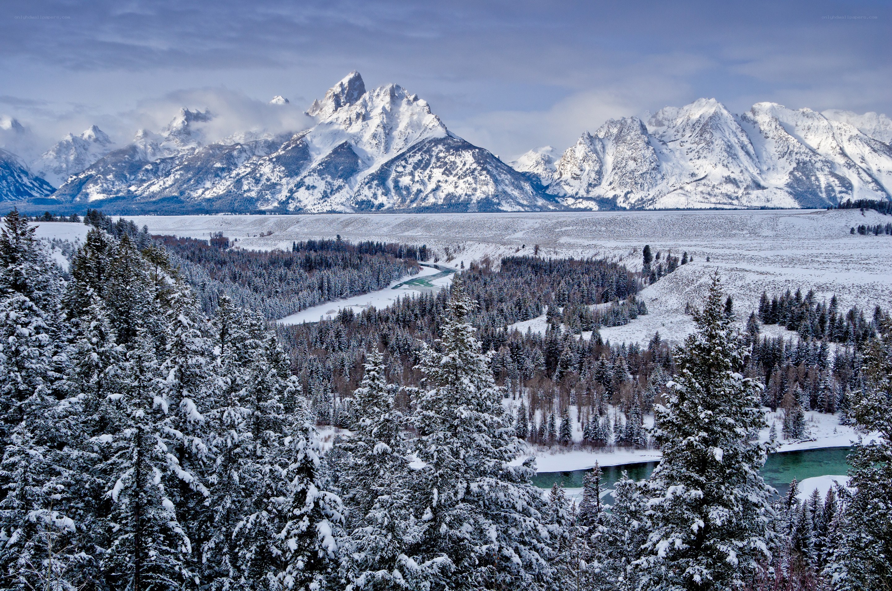 Snowy mountains and river landscape