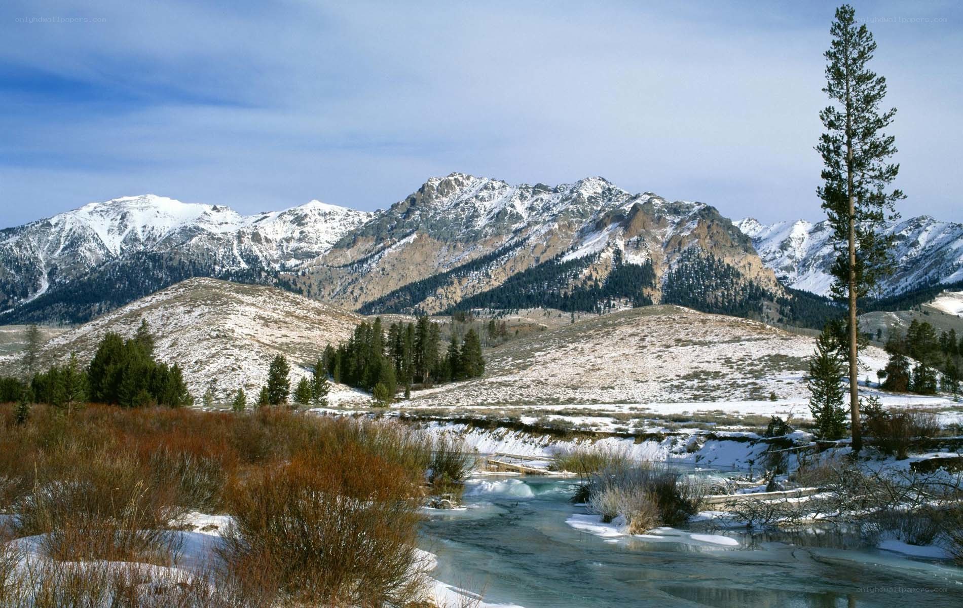 Snowy mountains and river landscape