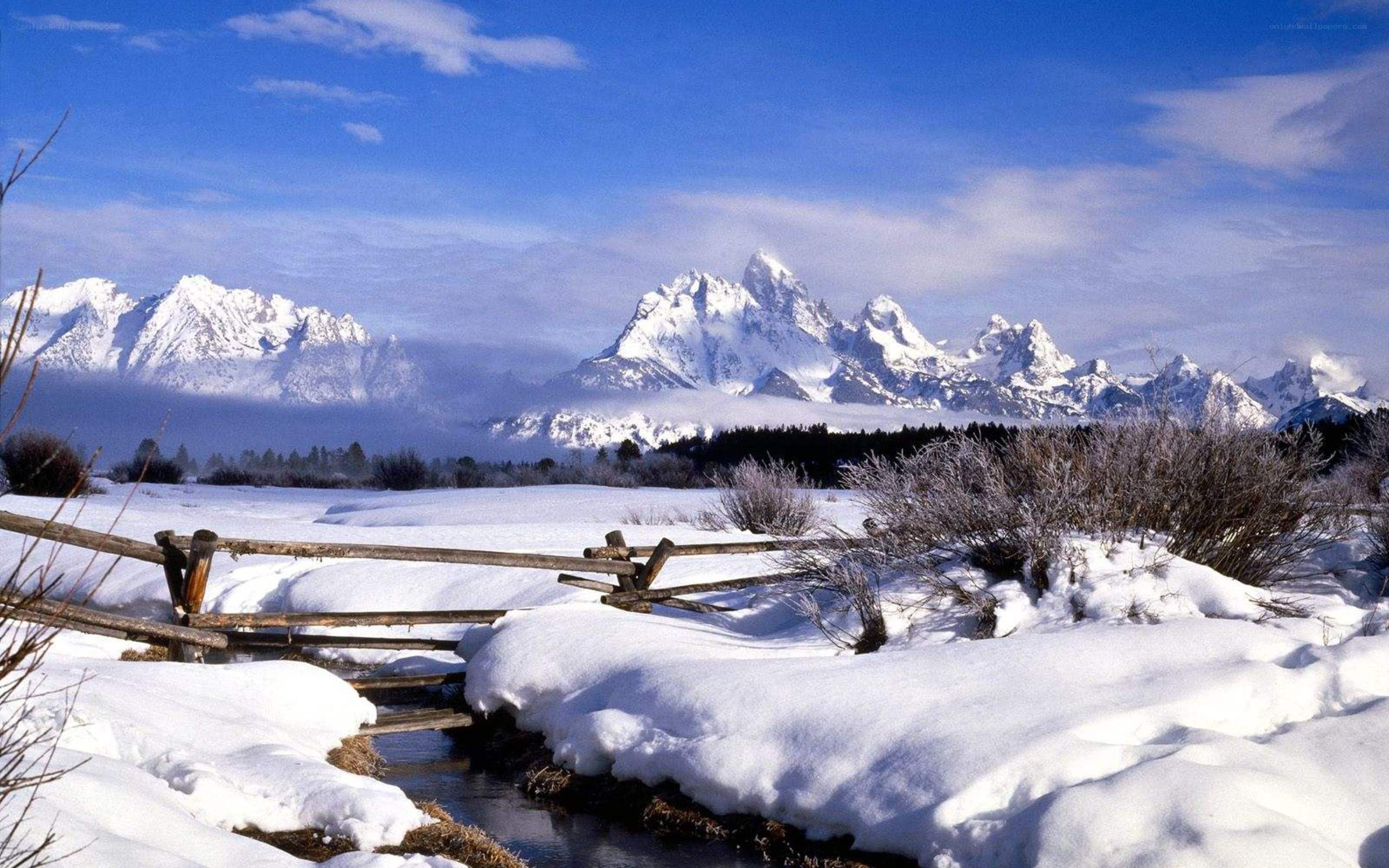 Snowy mountains and stream