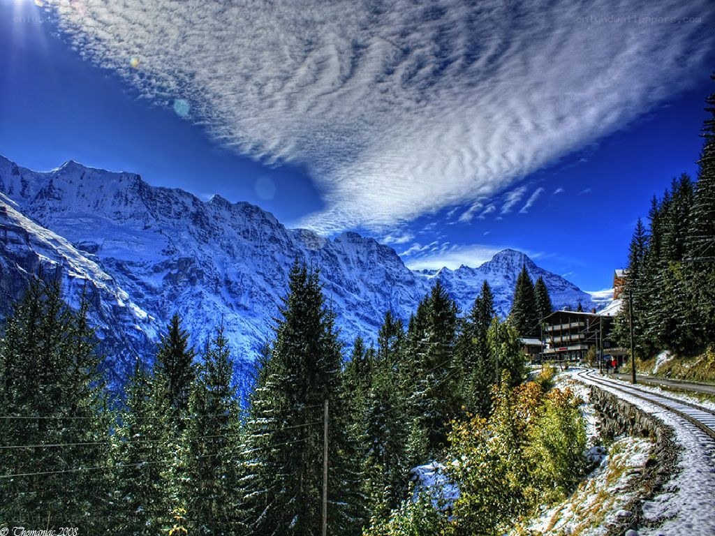 Snowy mountains and train tracks