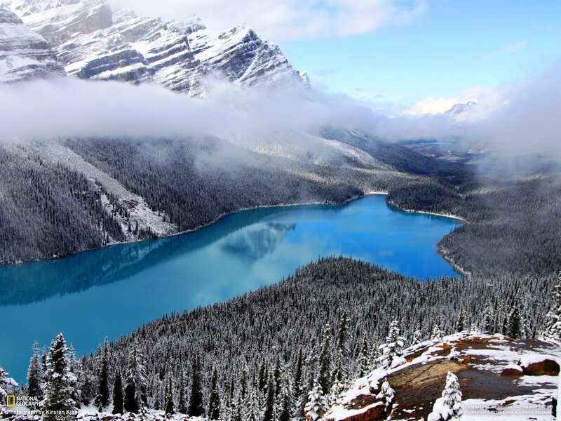 Snowy mountains and turquoise lake