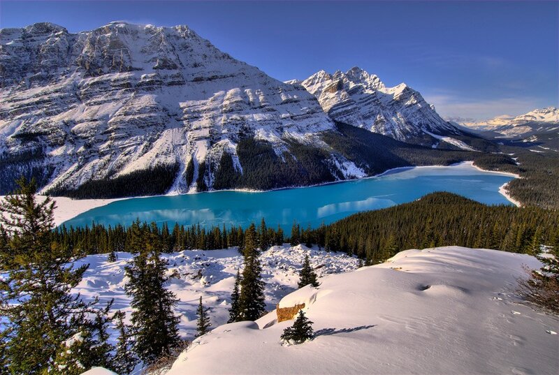 Snowy mountains and turquoise lake