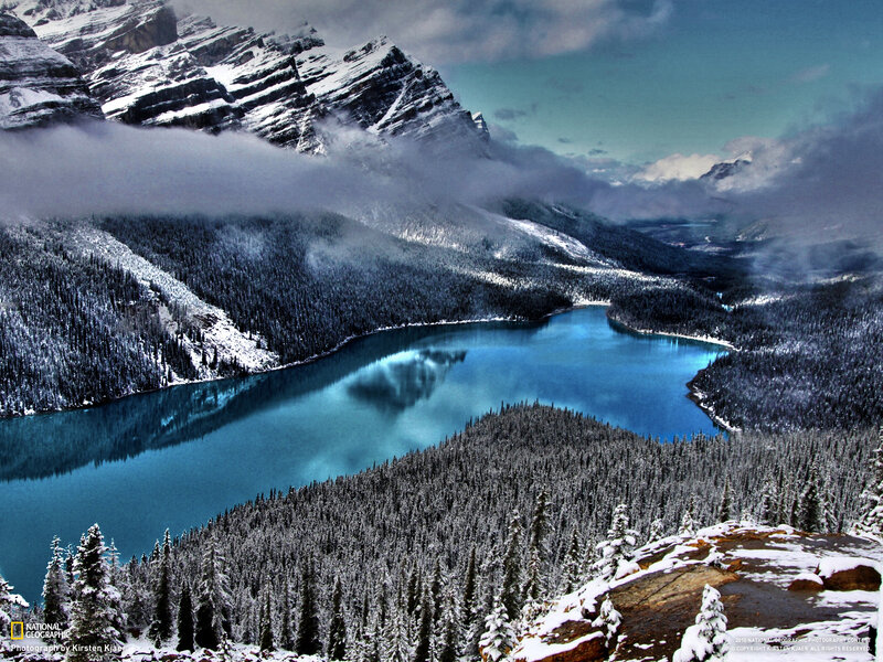 Snowy mountains and turquoise lake