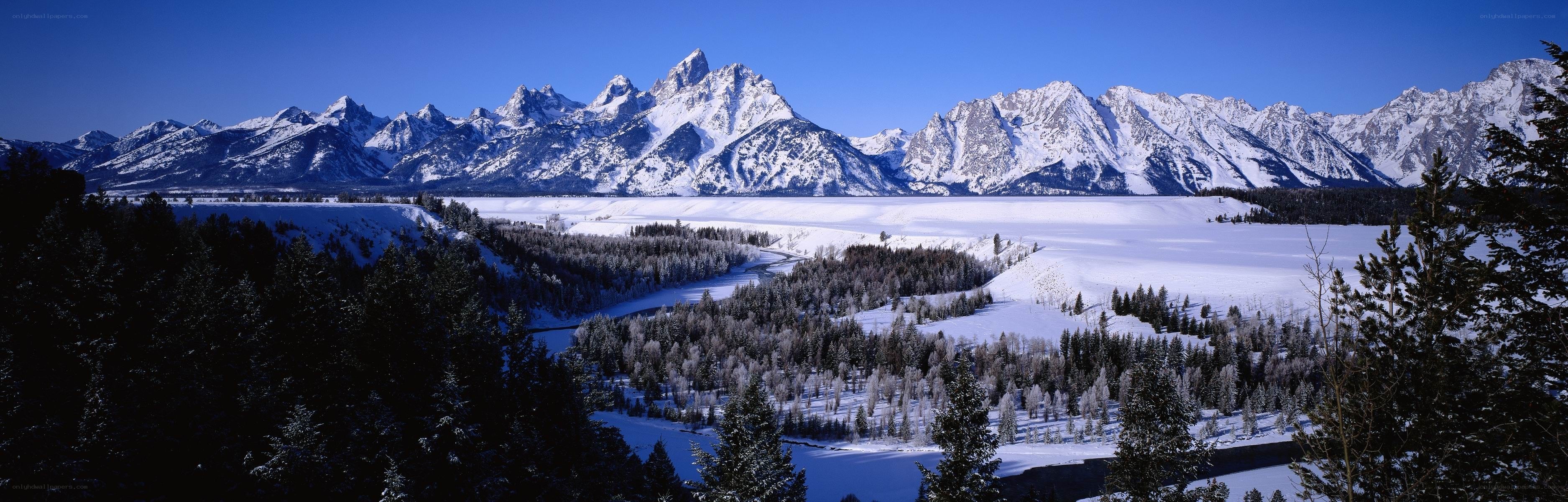 Snowy mountains and valley