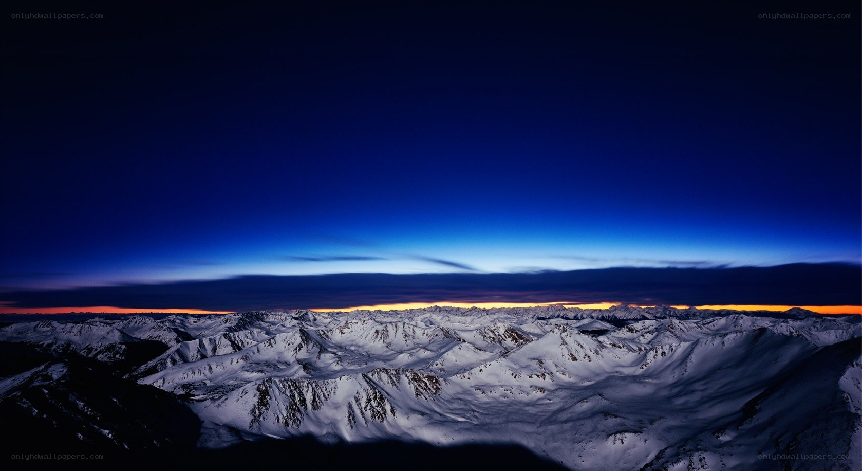 Snowy mountains at dawn