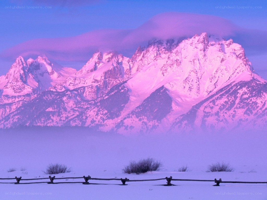 snowy mountains at dawn