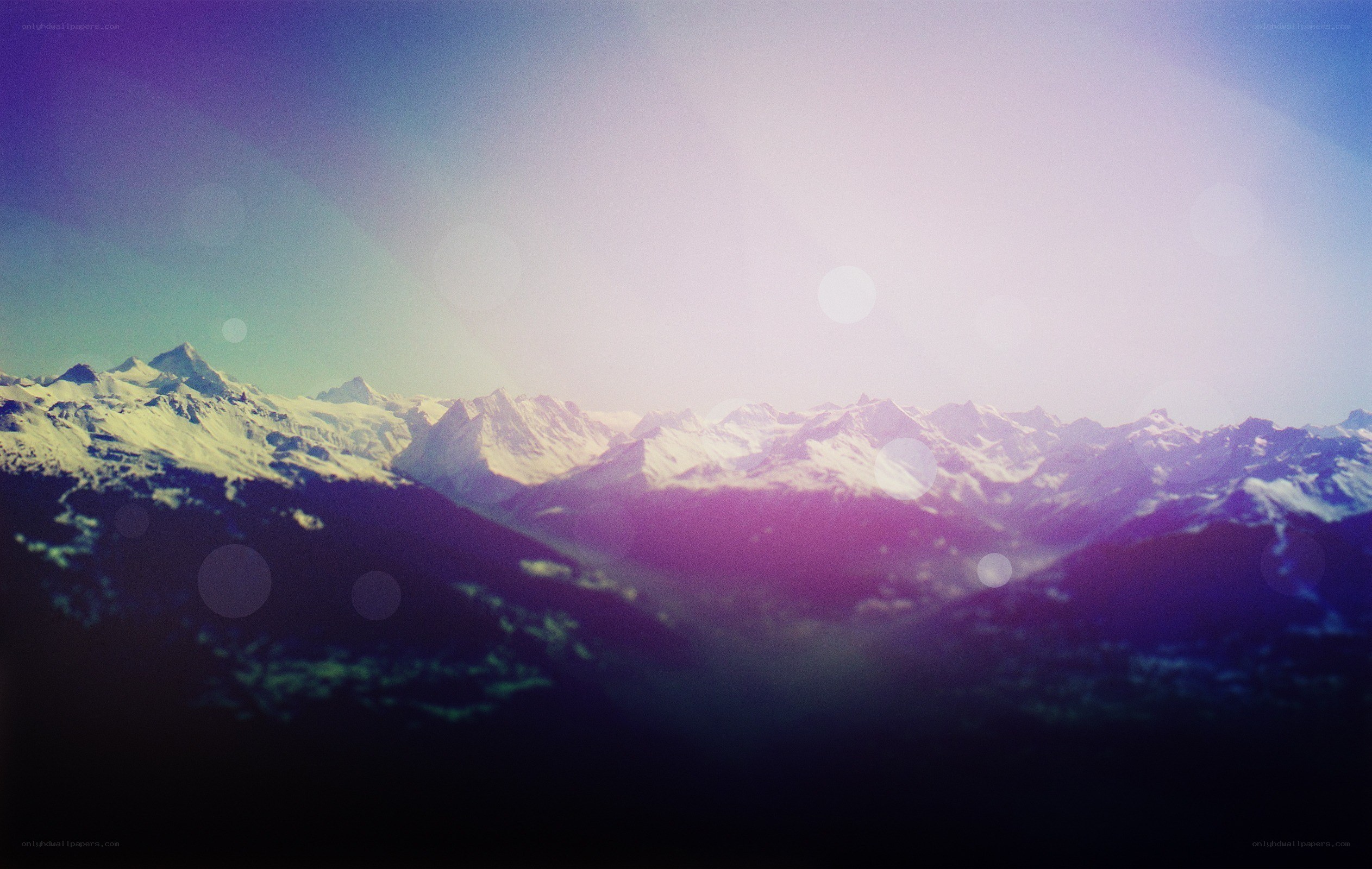 snowy mountains at dawn