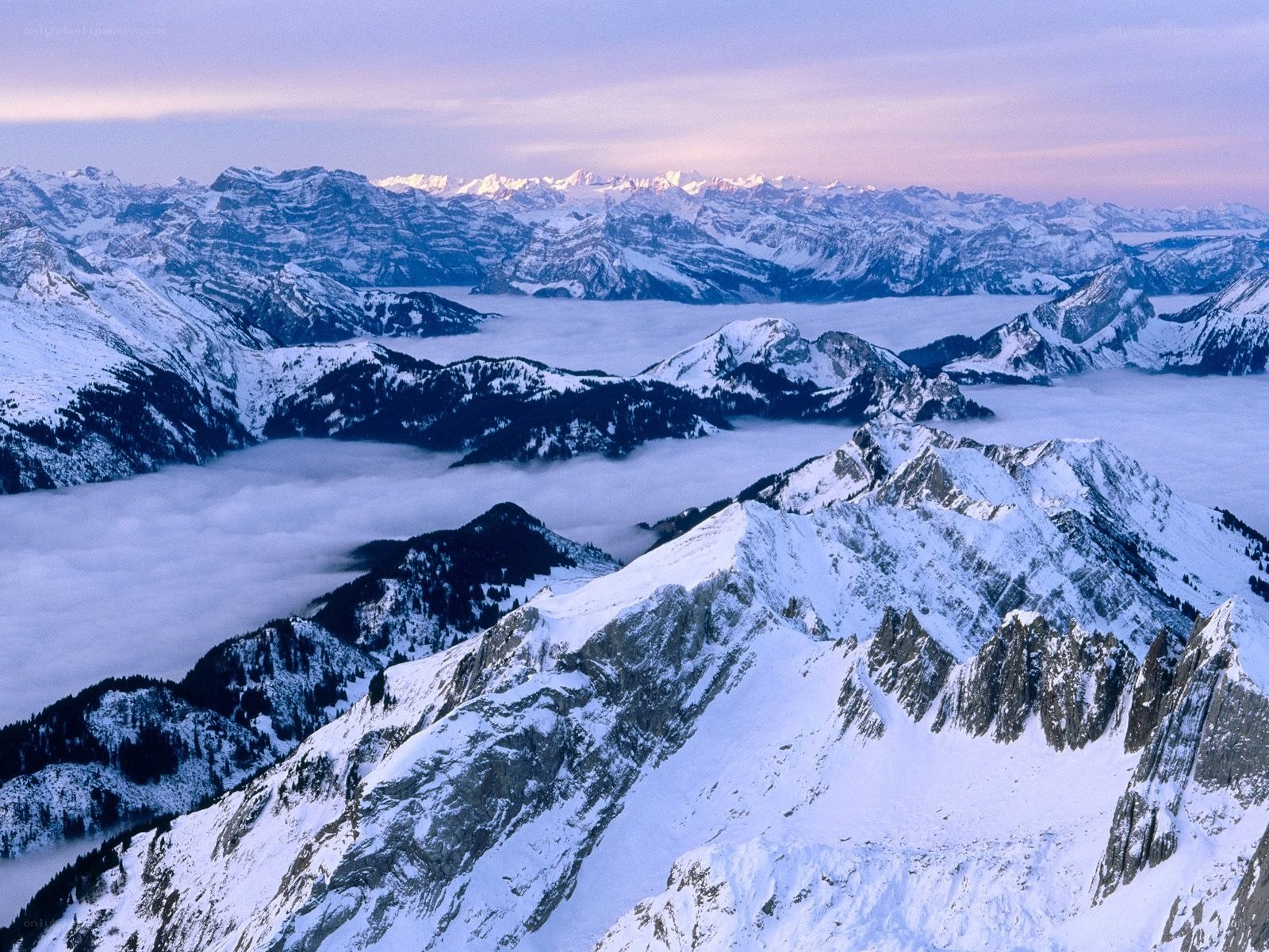 snowy mountains at dawn
