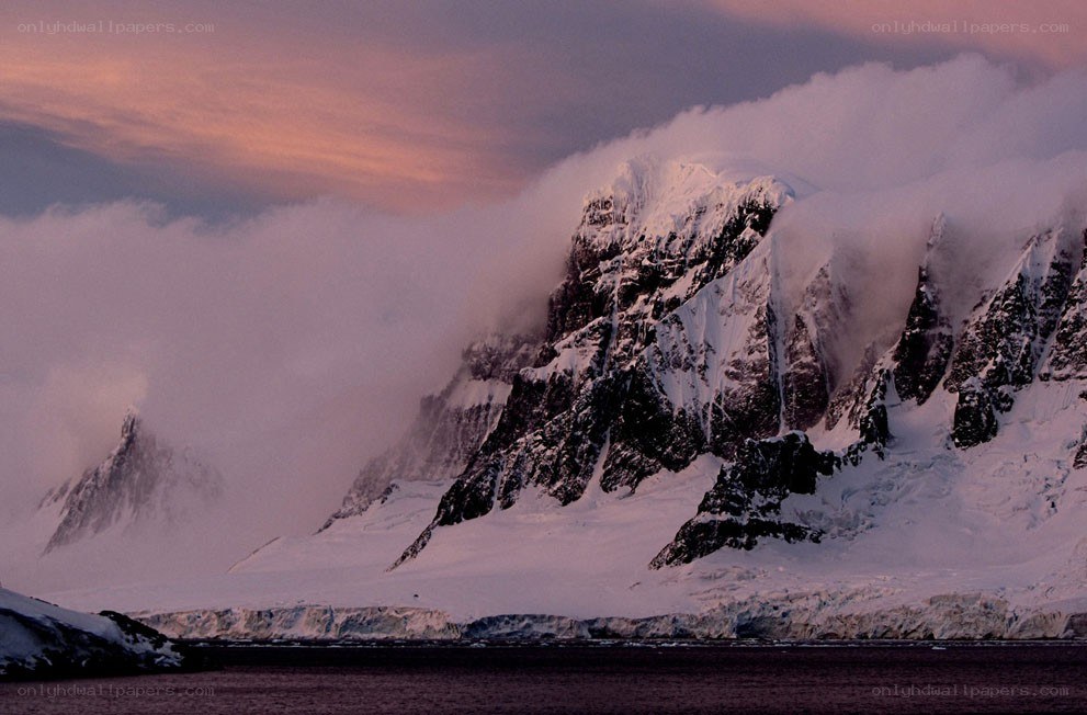 Snowy mountains at dusk