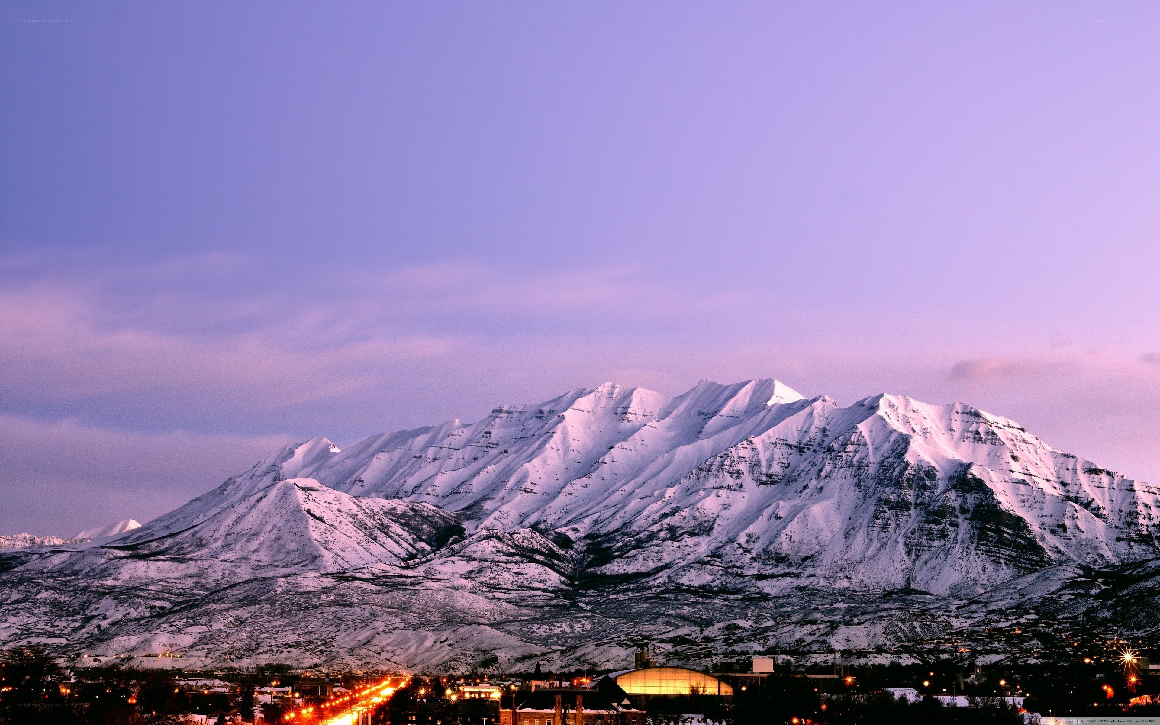snowy mountains at dusk
