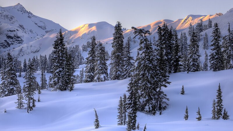 Snowy mountains at sunrise