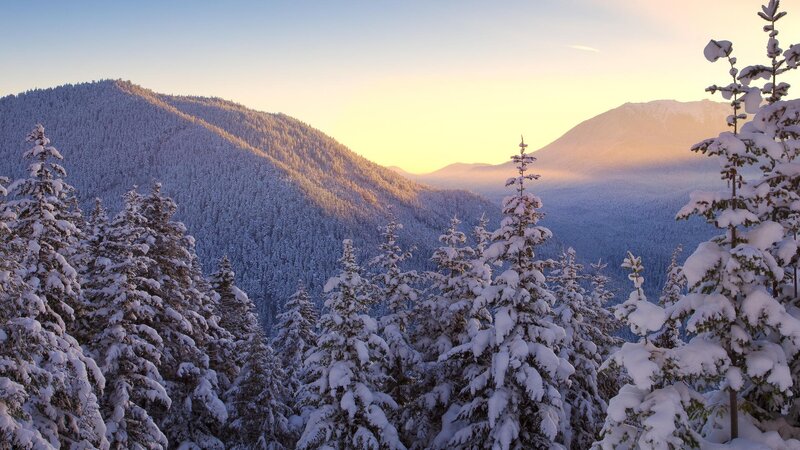 Snowy mountains at sunrise