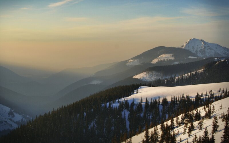 snowy mountains at sunrise