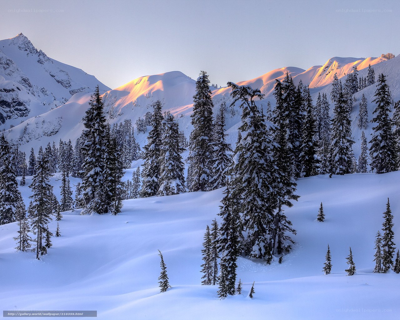 Snowy mountains at sunrise