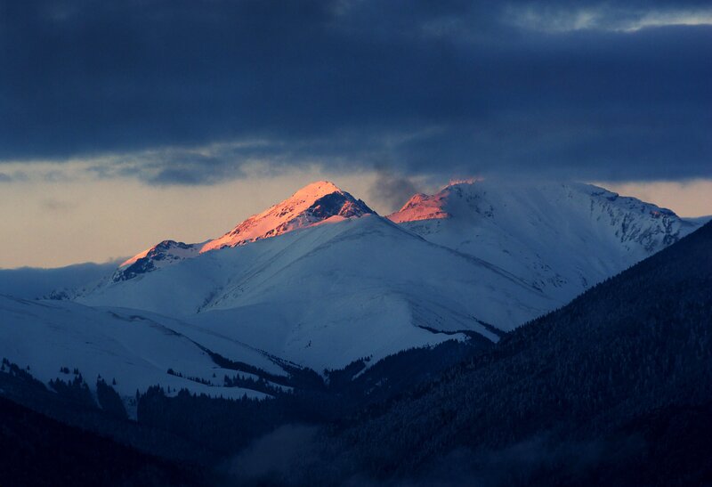 snowy mountains at sunrise