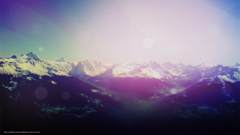 snowy mountains at sunrise