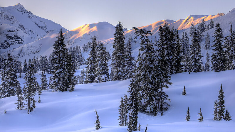 Snowy mountains at sunrise