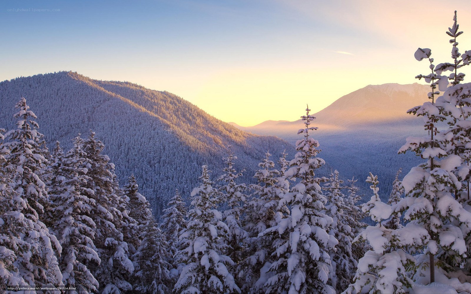 Snowy mountains at sunrise