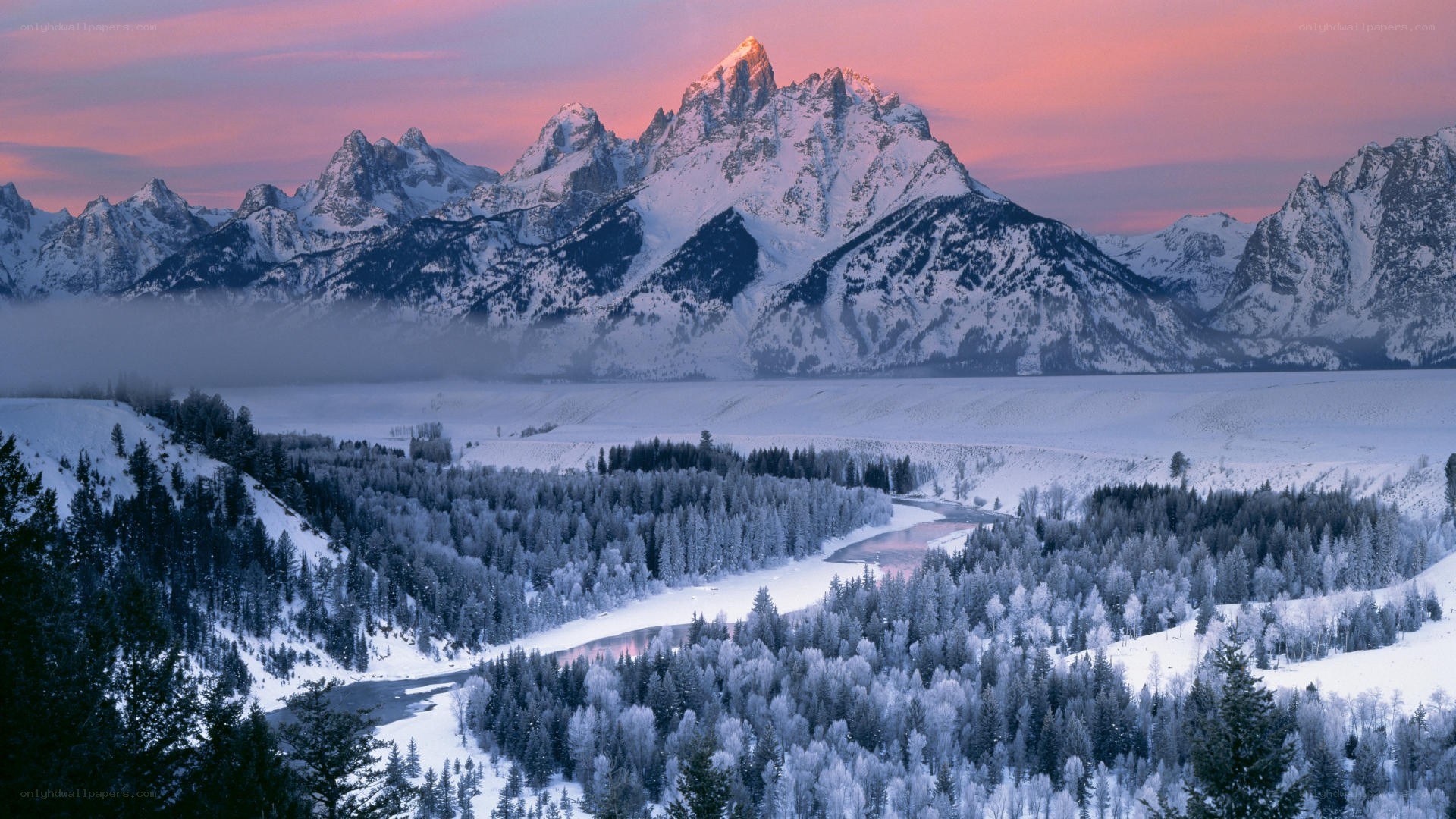 snowy mountains at sunset