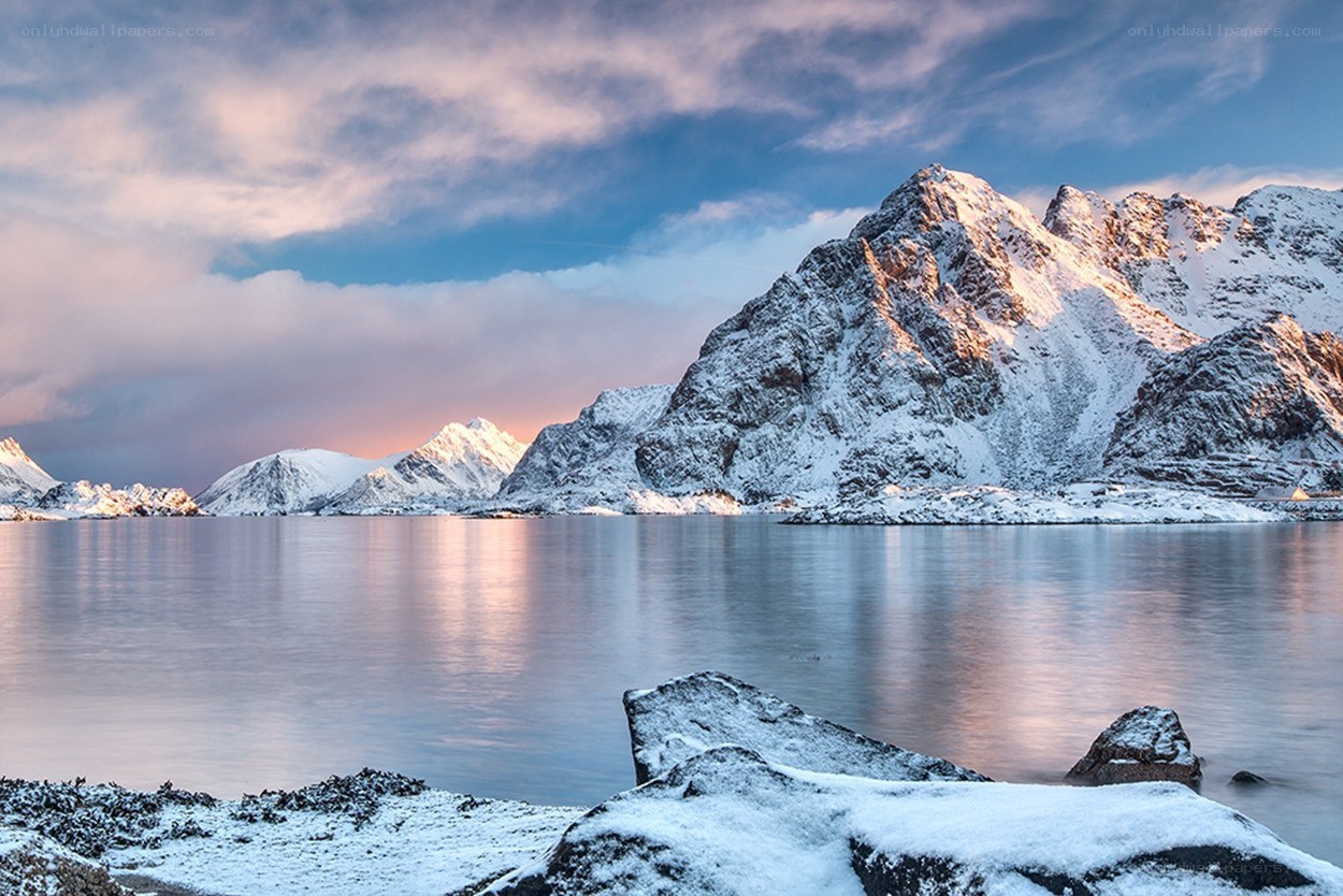 Snowy mountains at sunset
