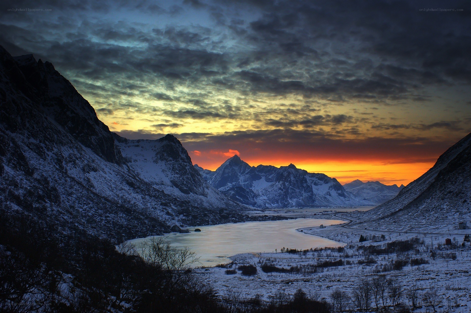 Snowy mountains at sunset