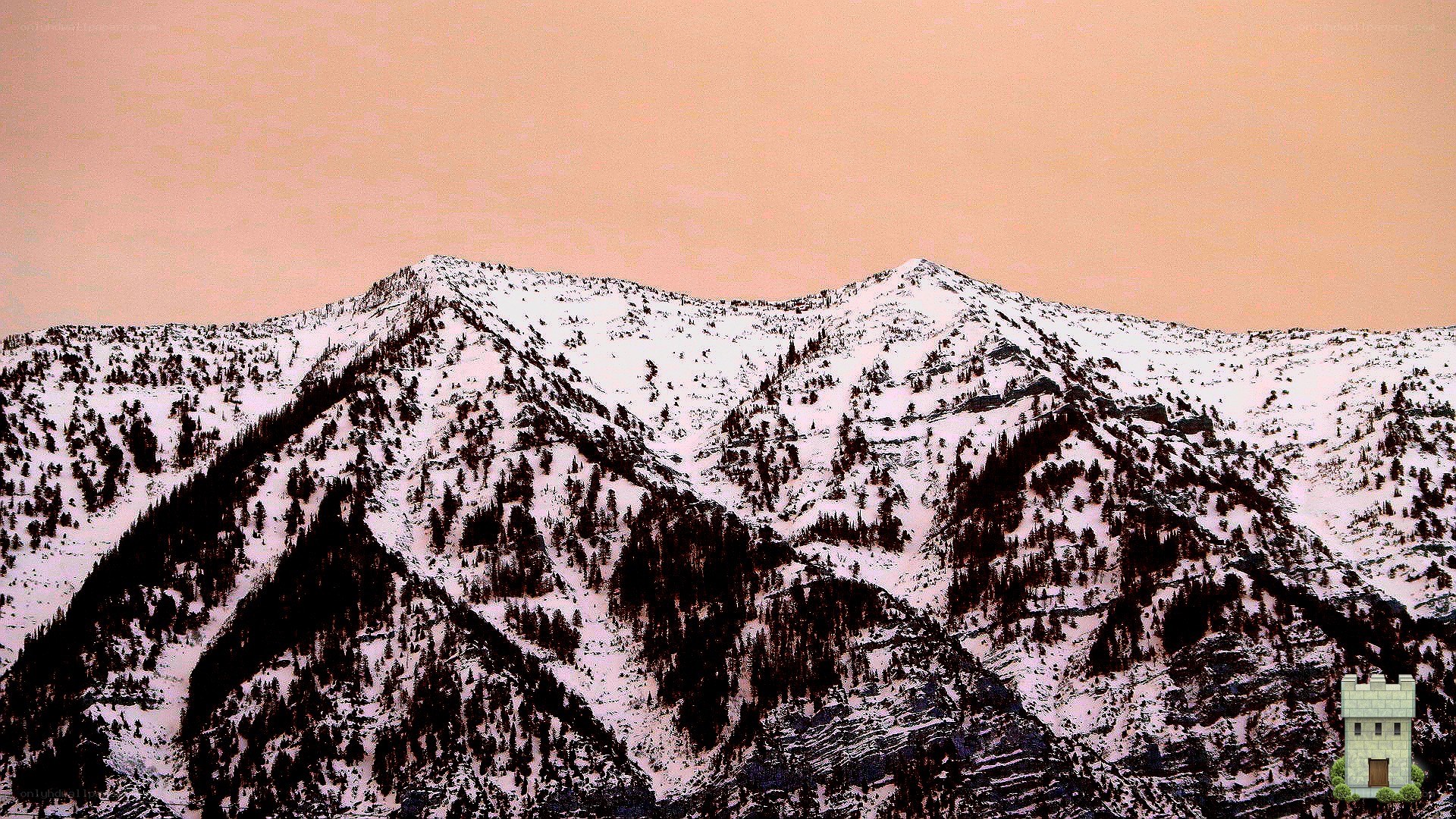 snowy mountains at sunset