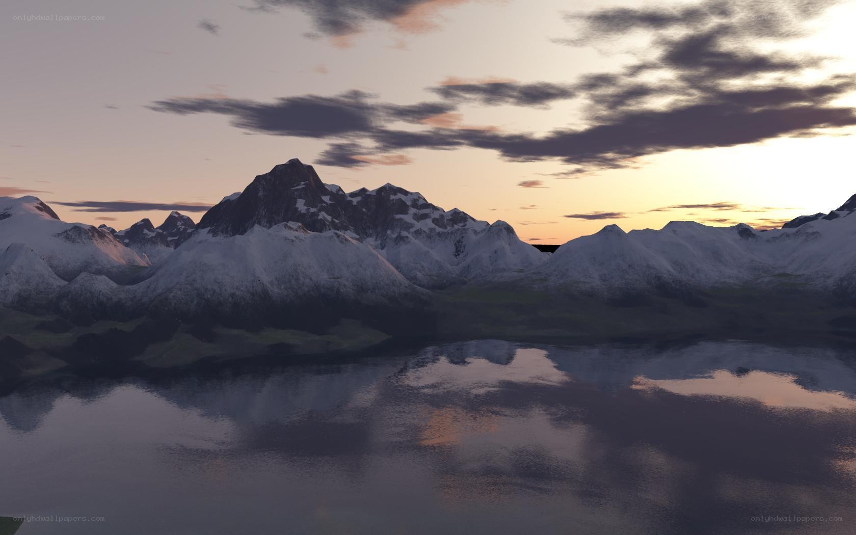 snowy mountains at sunset