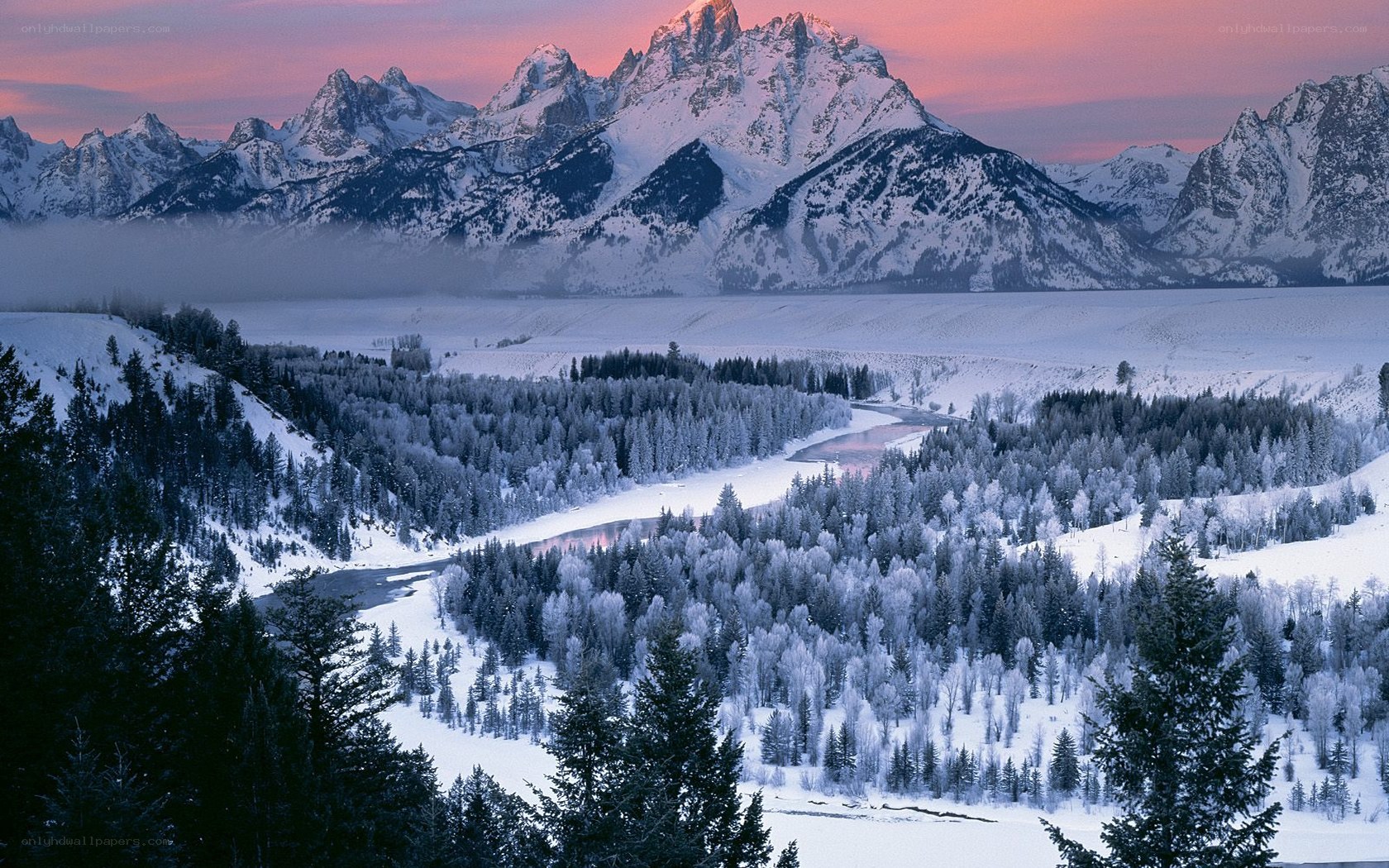 snowy mountains at sunset