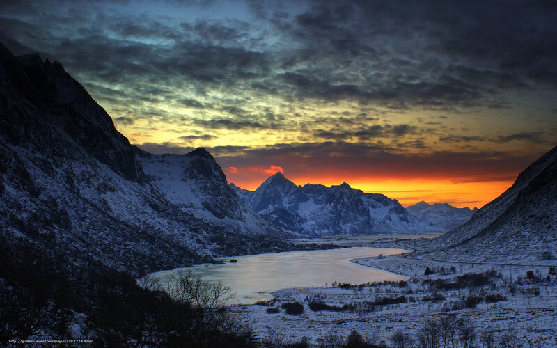 Snowy mountains at sunset
