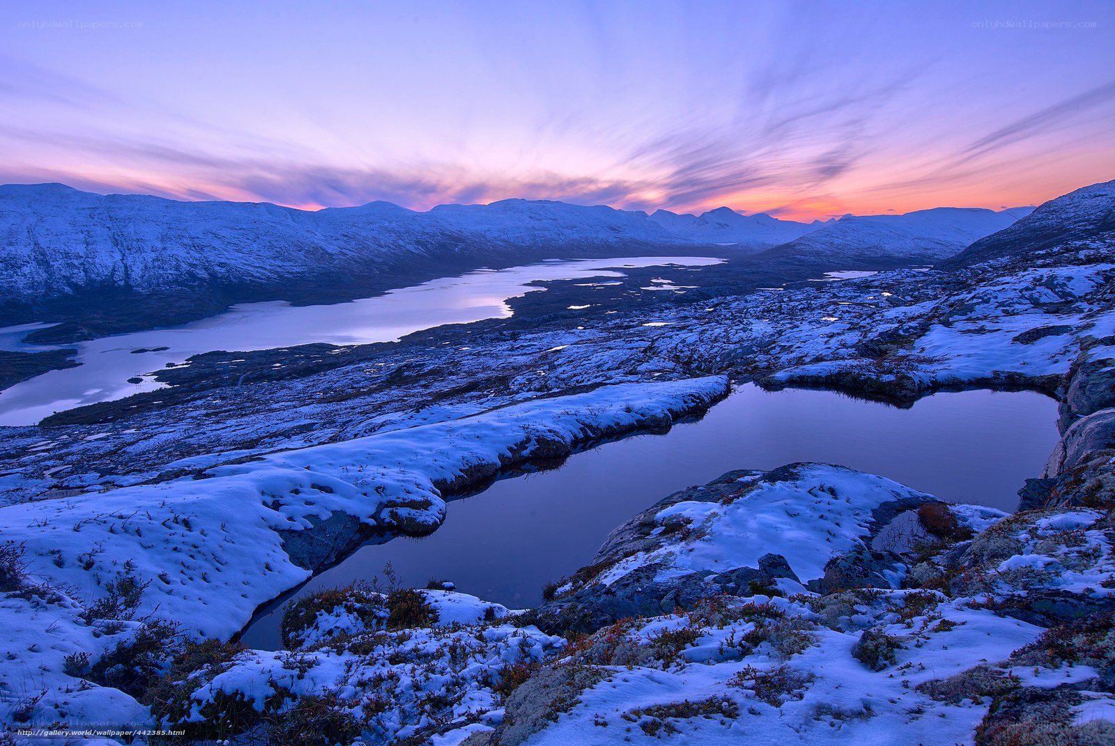 Snowy mountains at sunset