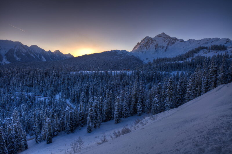 Snowy mountains at sunset
