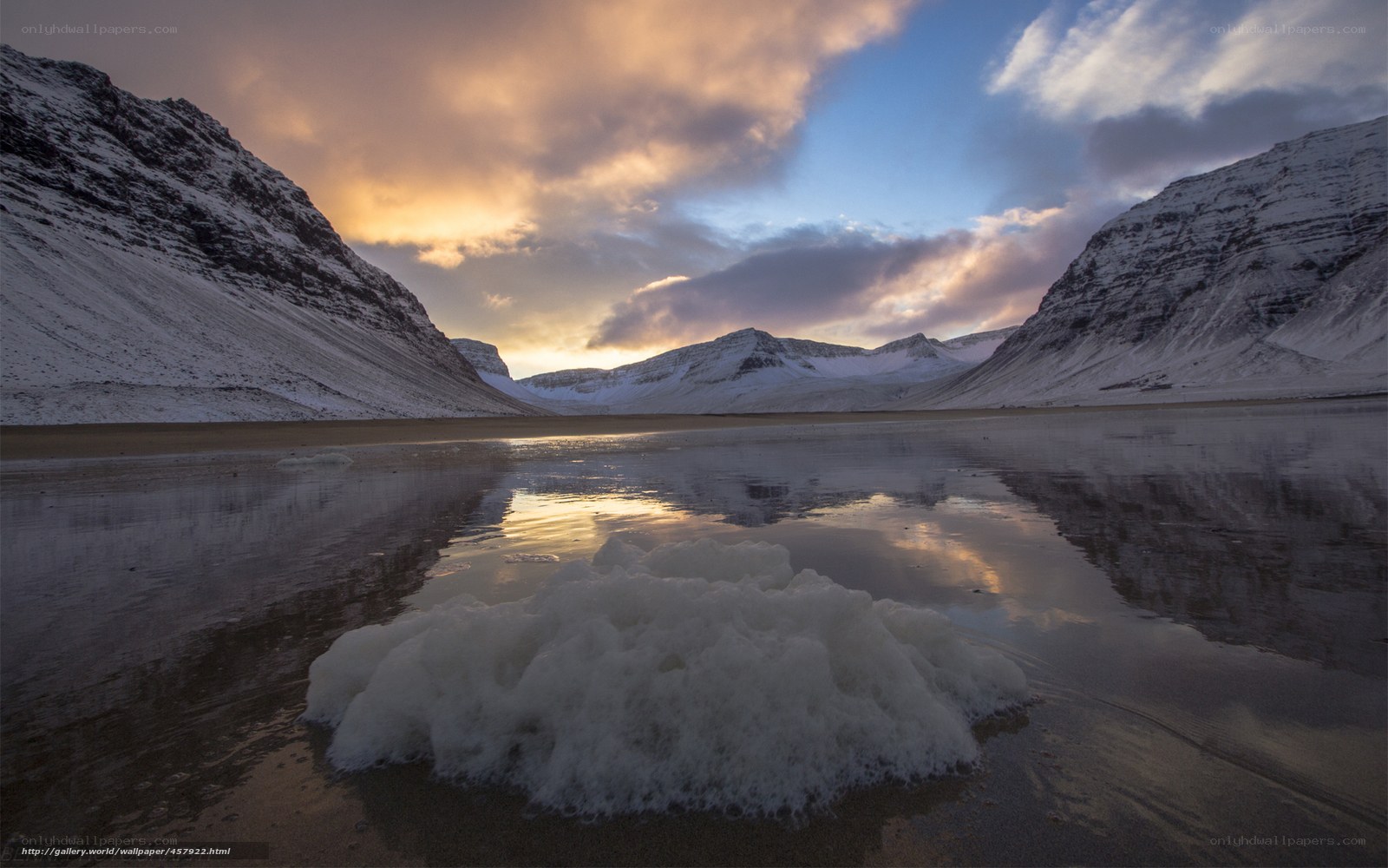 Snowy mountains at sunset