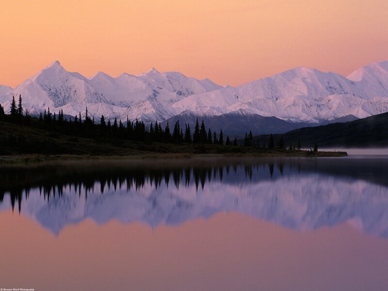 Snowy mountains at sunset