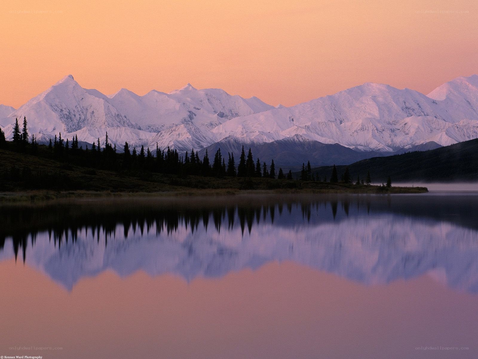 Snowy mountains at sunset