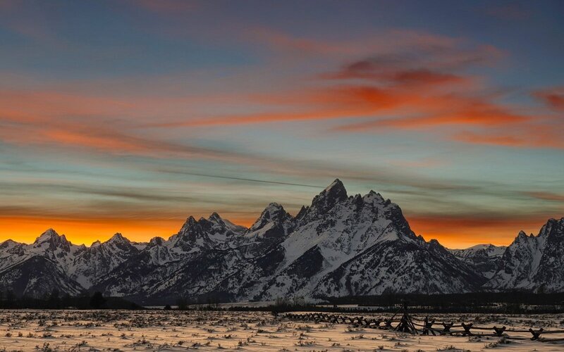 Snowy mountains at sunset