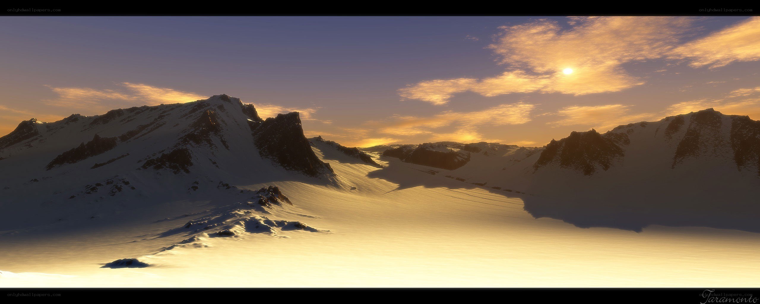 snowy mountains at sunset
