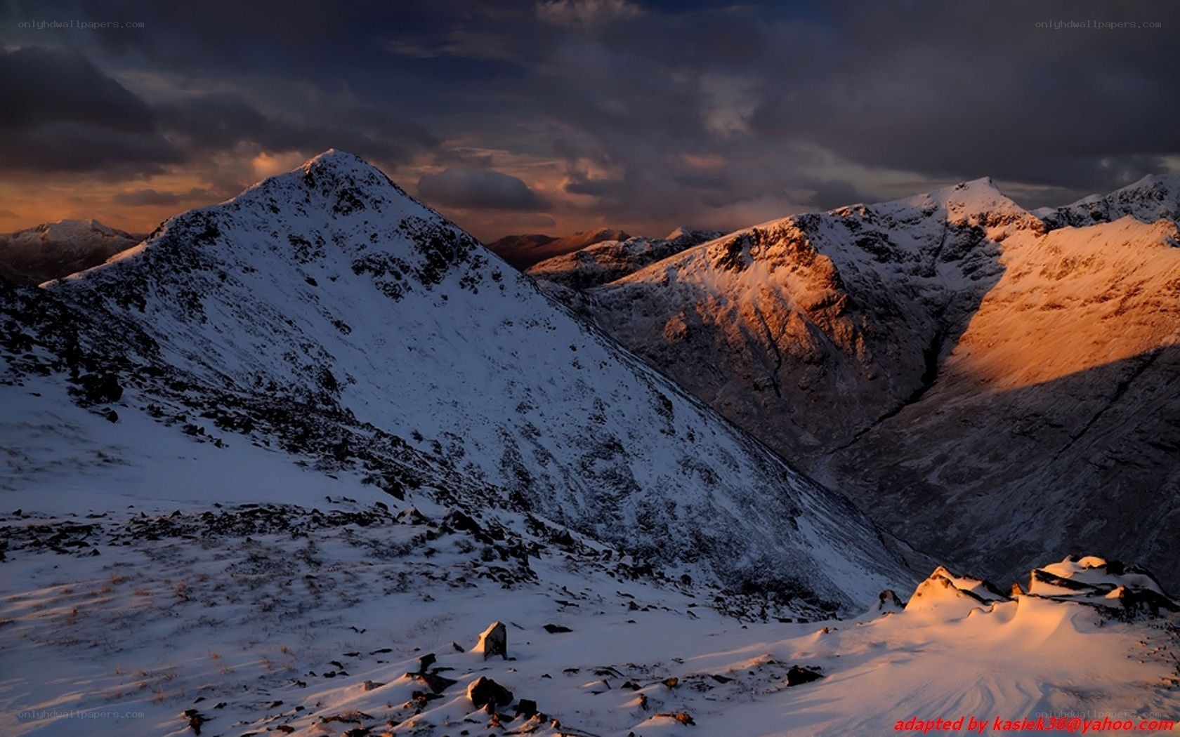 Snowy mountains at sunset