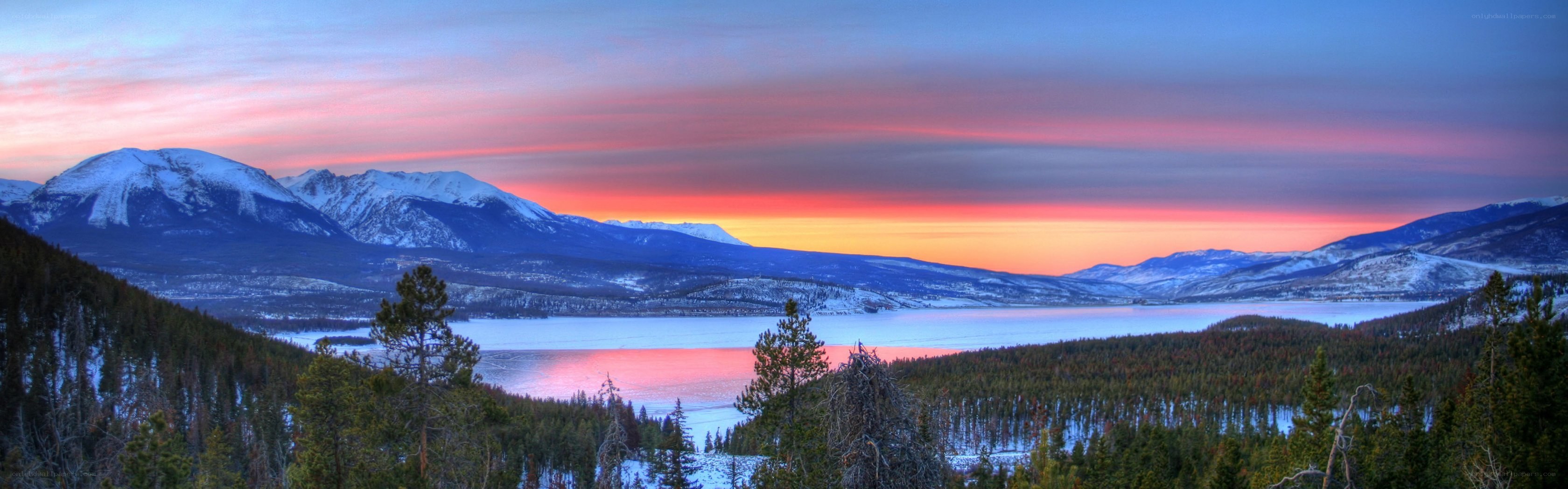 Snowy mountains at sunset