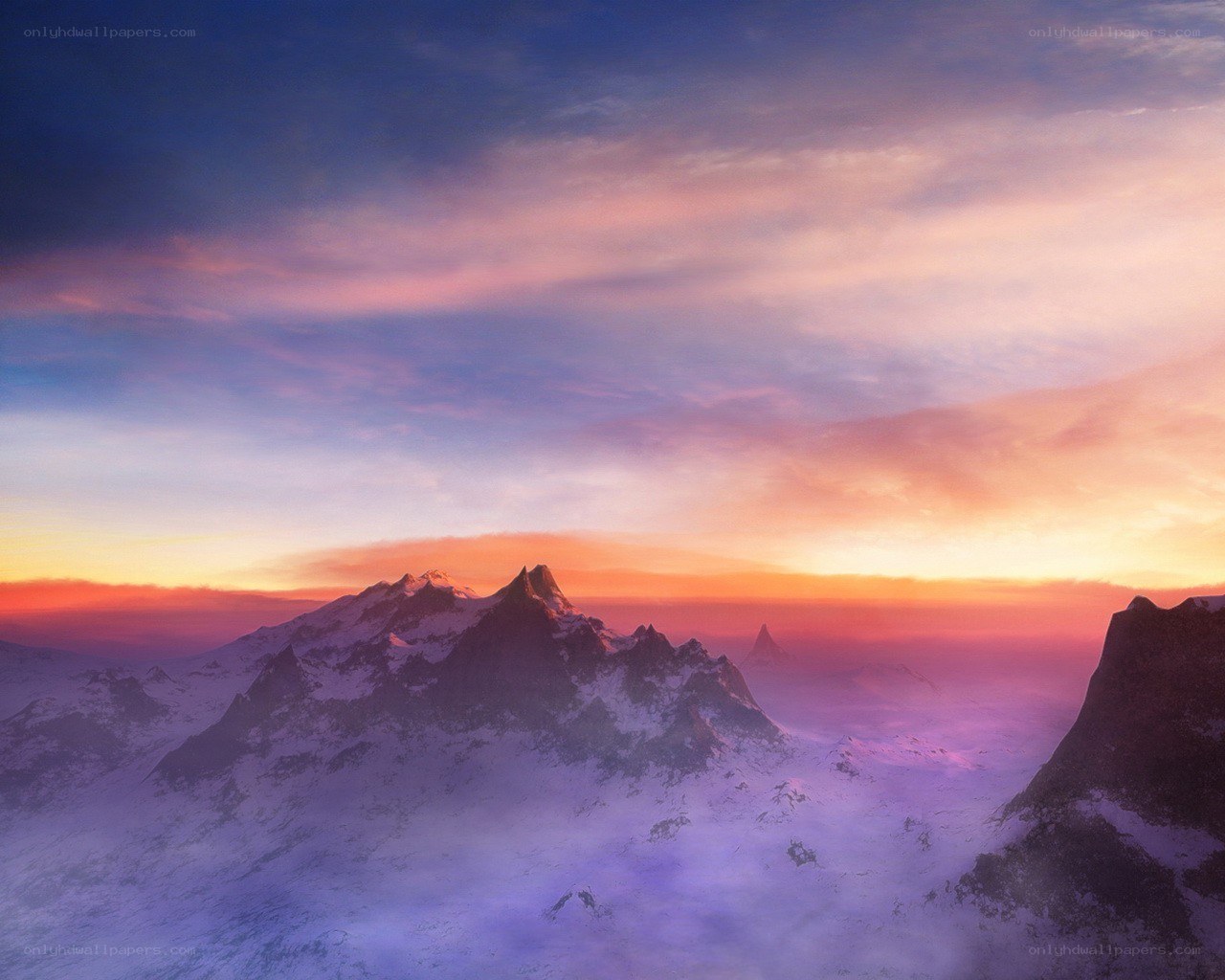 Snowy mountains at sunset