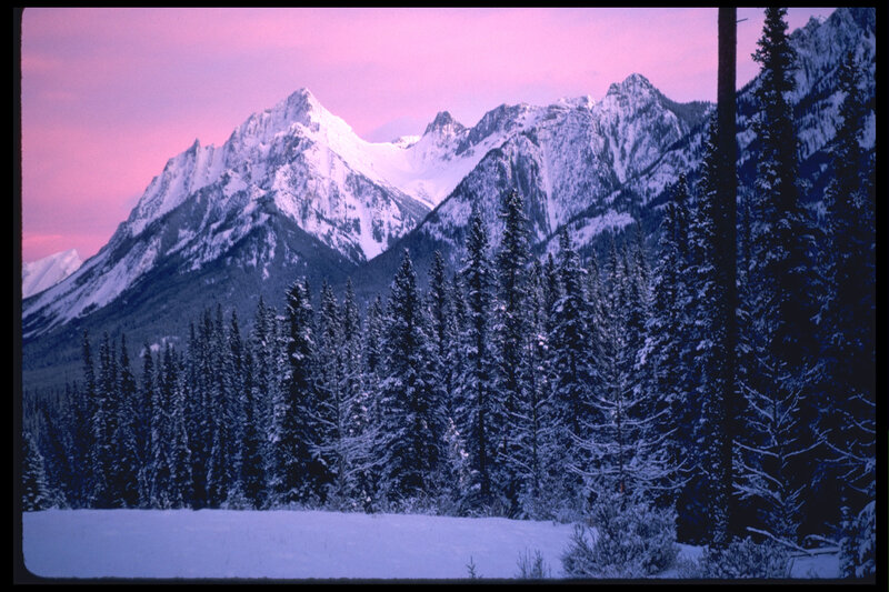 Snowy mountains at sunset