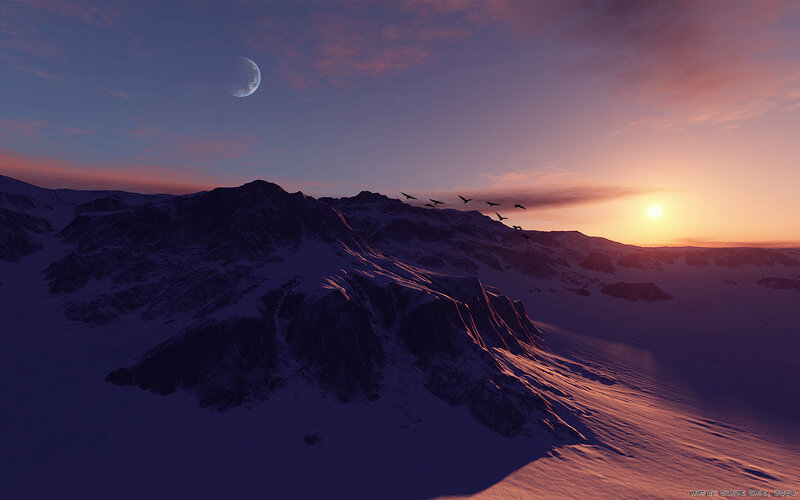 Snowy mountains at sunset