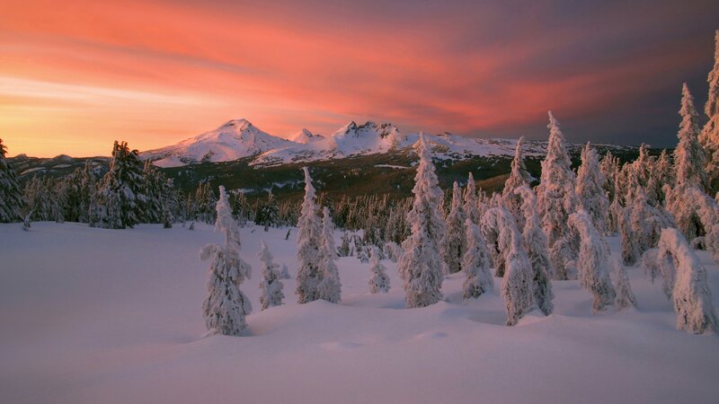 Snowy mountains at sunset