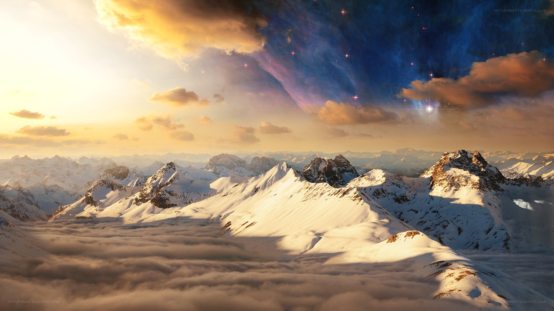 snowy mountains at sunset