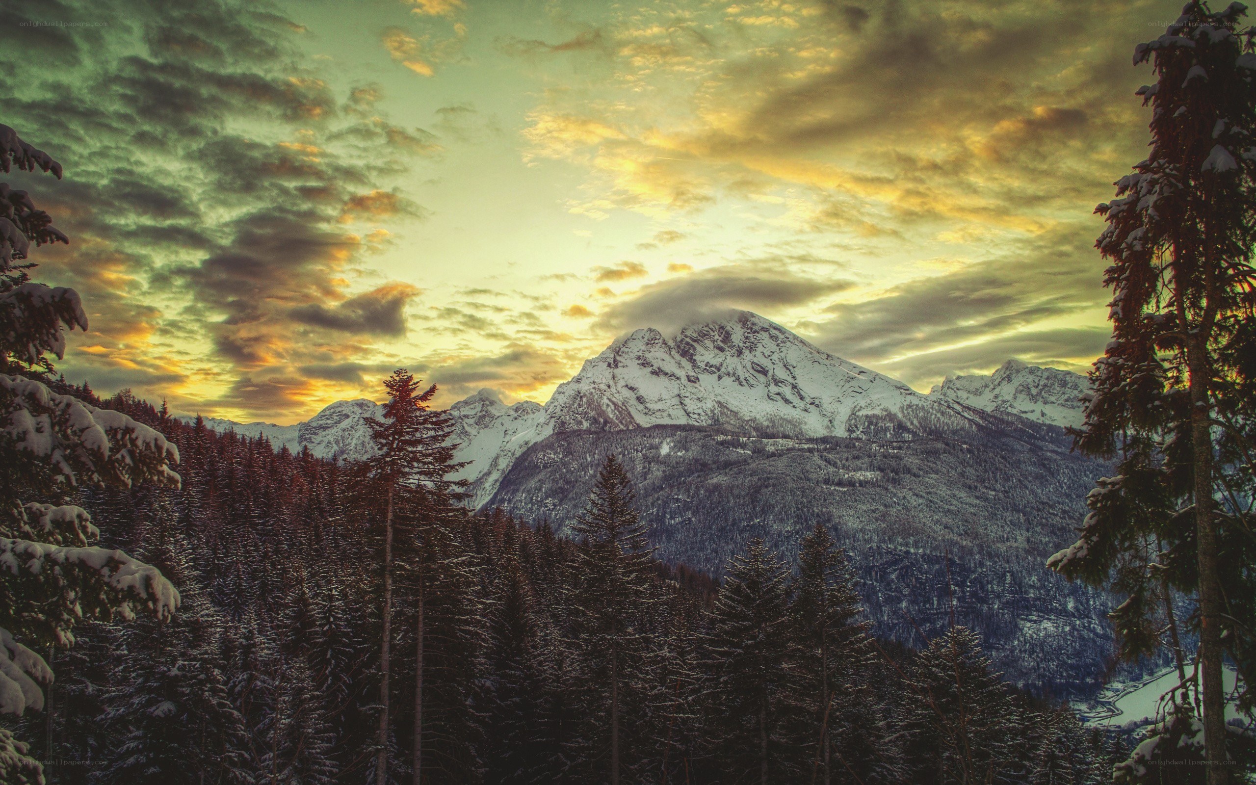 Snowy mountains at sunset
