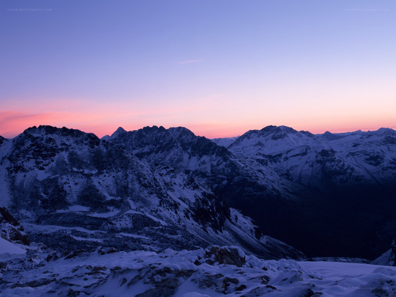 Snowy mountains at twilight
